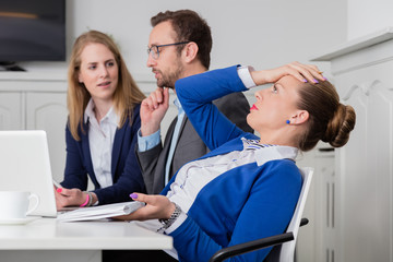 Dissatisfied businesswoman on a meeting 