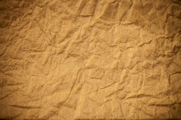 Brown crumpled eco paper background.
