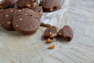 Chocolate cookie with Cashews on wooden background