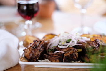 Kebab with glass of wine