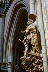 Wooden statue of a man holding orb and mace in St Vitus Cathedra