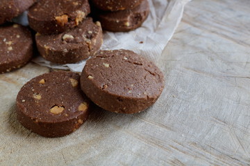 Chocolate cookie with Cashews on wooden background