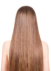 Girl with long straight hair isolated on a white