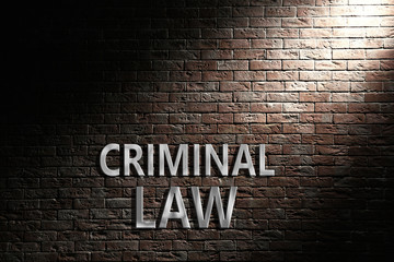 "Criminal Law" text on brick wall