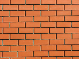 New brick wall from red bricks