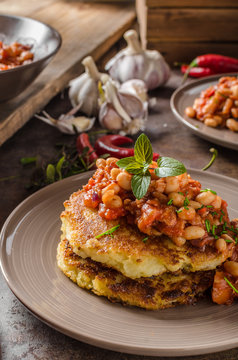 Bake beans with fluffly potato cakes