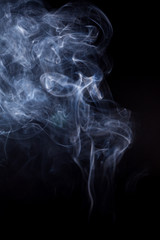 White smoke on a black background.