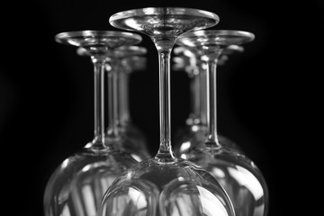 Empty wine glasses on black background, closeup