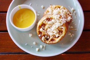 Tropical waffles with coconut and lilikoi passion fruit curd