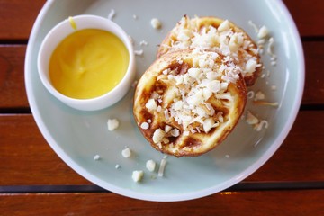 Tropical waffles with coconut and lilikoi passion fruit curd