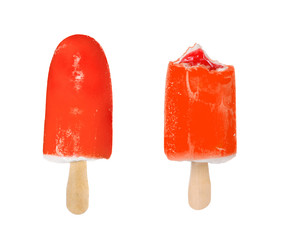 Set of two popsicles in red glaze isolated on white background.