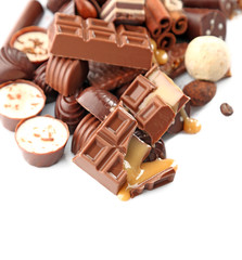 Assorted chocolate candies, isolated on white