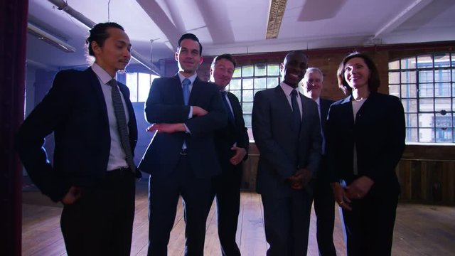  Portrait of attractive diverse business group in urban industrial building