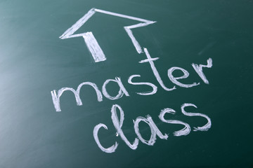 Master class inscription written with white chalk on blackboard
