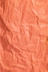 Fototapeta premium Red crumpled paper texture for background.