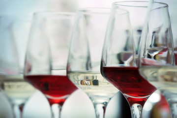 Wine glasses with red and white wine, closeup