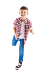 Little boy running forward, isolated on white