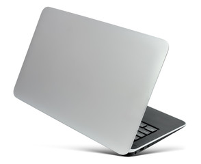 Flying thin aluminium laptop, rear view,  isolated on a white