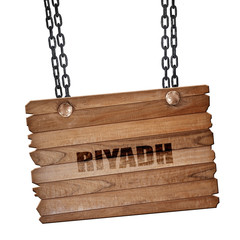 riyadh, 3D rendering, wooden board on a grunge chain