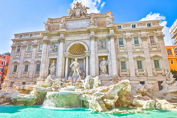 Fototapeta na wymiar Spectacular Trevi Fountain, designed by Nicola Salvi Baroque era, in a sunny day, one of the most famous fountains in the world, capital of Rome, Lazio, Italy.