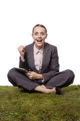 business female sittting on grass