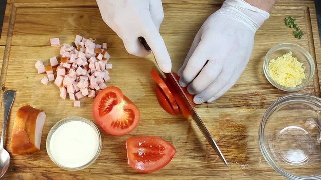 cooking mini canapes of meat and vegetable sauces