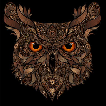Vector owl from abstract patterns on black background