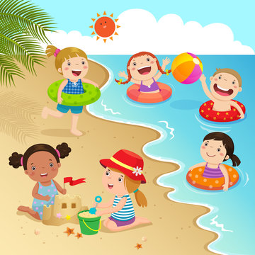 Group of kids having fun on the beach