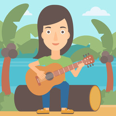 Woman playing guitar.