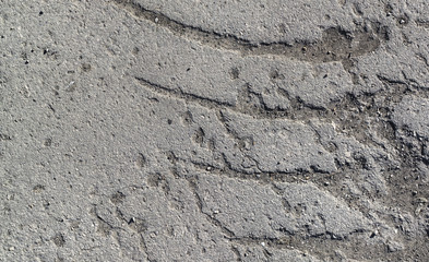 Texture of the old road with cracks