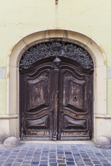Ancient door in one of the buildings of Budapest
