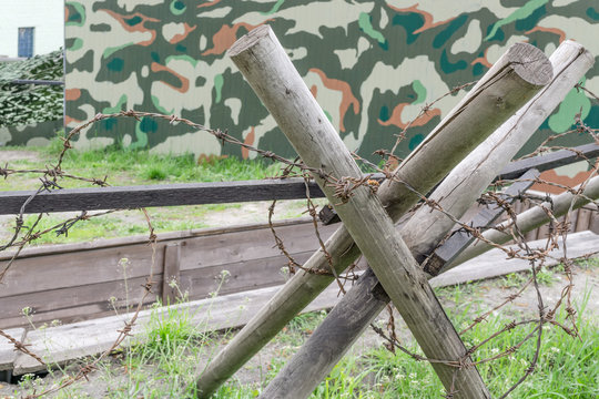 Antipersonnel obstacle with barbed wire