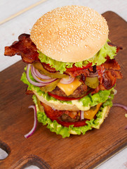 Burger With Beef, Bacon, Tomato, Cheese, Lettuce and Onion