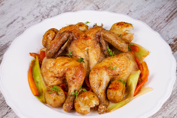 Roasted chicken with potato, carrot, leek and thyme