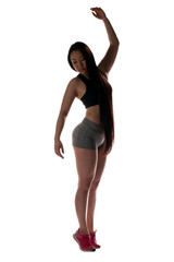 Young asian woman in sportswear posing