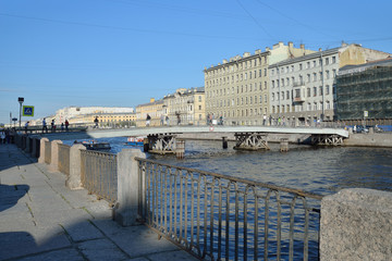 Call wooden pedestrian bridge across the river Fontanka