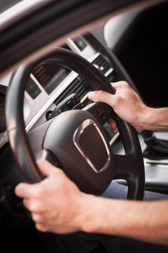 Hands on steering wheel