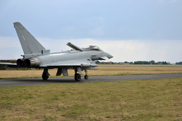 Fototapeta na wymiar Jet fighter on a runway
