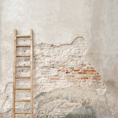 weathered stucco wall with wooden ladder background - 110619666