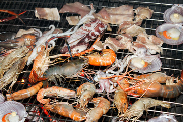Shrimp, squid, scallops seafood grill.