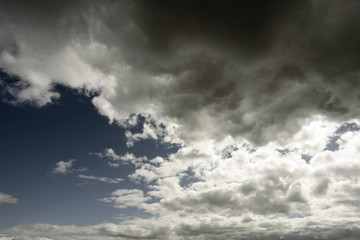 Grey White Summer Clouds and Blue Sky
