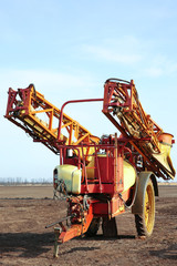 Modern farm equipment in field