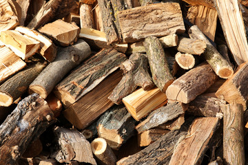 Firewood background - chopped firewood