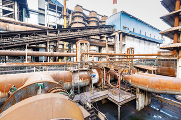 Industrial pipeline equipment scene in the old steel mill
