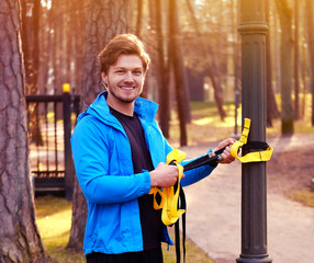 A man with strips in a park.