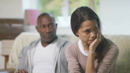  Relationship issues - woman is stressed & upset while man looks at computer