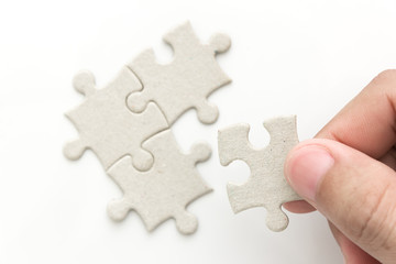 hand holding last puzzle