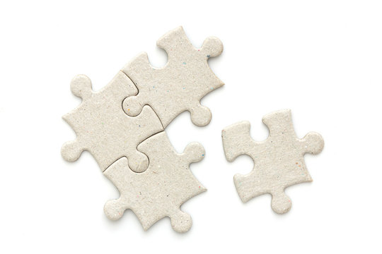 Top View Of Puzzle Jigsaw On White Background