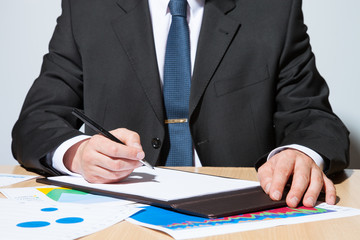 Businessman  signing a contract