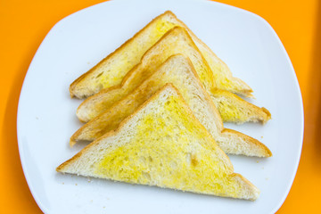 Toast butter and sugar.